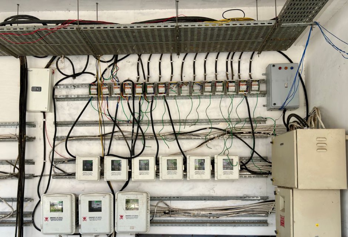 Industrial electrical control panel with wiring, circuit breakers, and meters - similar in complexity to the automatic transfer switch infrastructure a standby generator requires